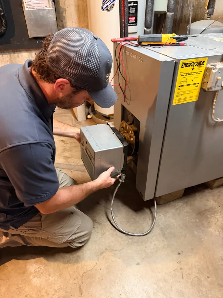 Patrick Brady servicing a residential boiler in Pepperell, Massachusetts